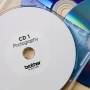 Ptouch CD/DVD Etiketten Film, Brother DK-11207, QL-500/550, Rolle à 100 Stk.