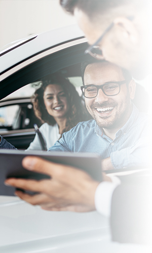 Smiling man in vehicle